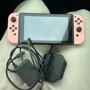 Nintendo Handheld Console with Pink Controllers